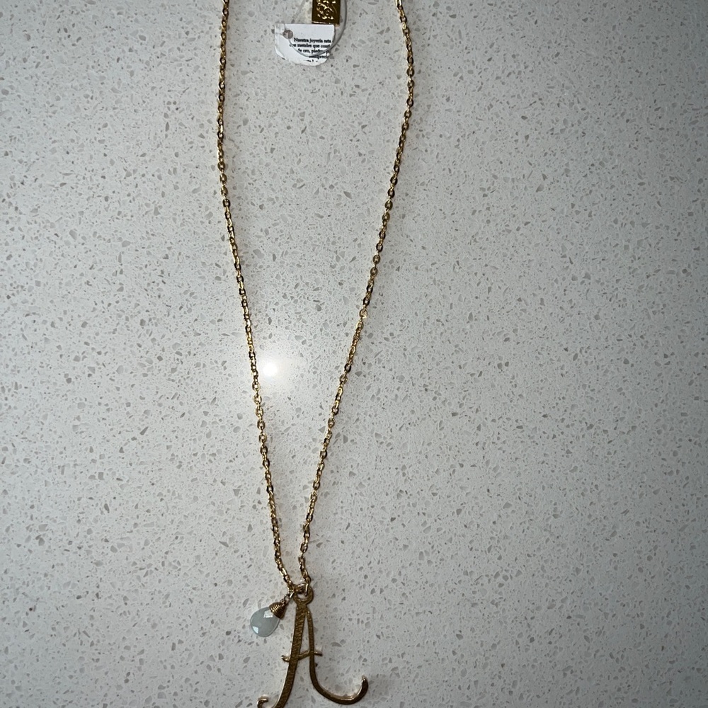 4u by Ana O necklace jewelry.

Pendant is letter “A”

18.75” length

Gold plated
